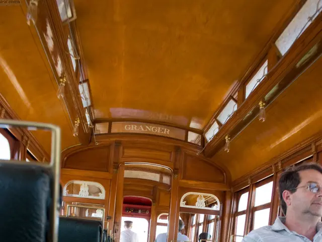 Luxury automobile, a Bentley worth $420k, hoisted onto the restaurant's rooftop of a...