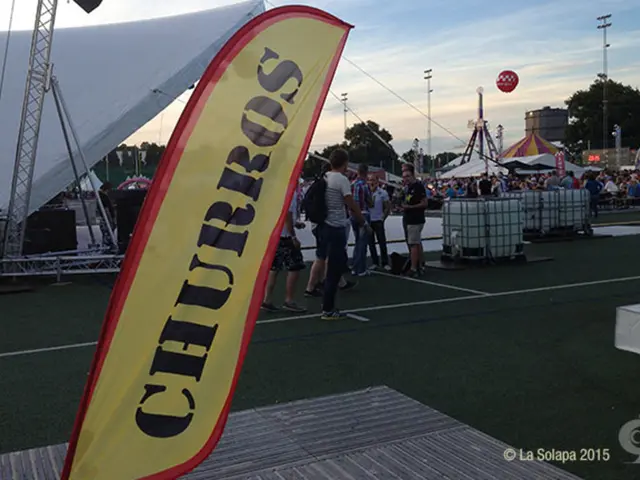People congregating at the Tollwood Summer Festival, organized by Amazon.